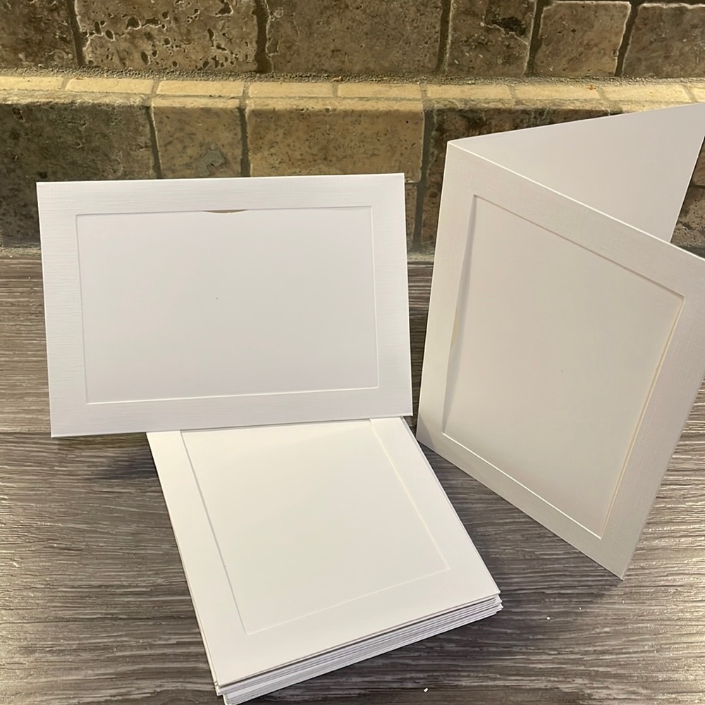 Set of 16 white photo cards with matching envelopes!